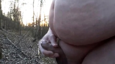 Chubby masturbates in the woods