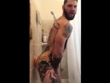 Tatted Hunk Fucks Dildo in Shower Until He Cums