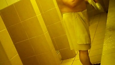 Naked men in public pool shower