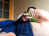 Student fucks in a hostel with a cucumber