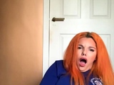 Redheaded amateur MILF with a sex toy on webcam show