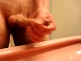 Solo male wanks and cums with lots of precum