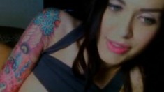 Tattooed Brunette Shows Off Her Fabulous Tits And Ass On The Webcam