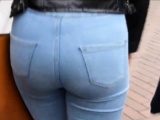 Candid blonde teen with sexy curves in jeans