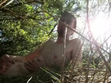 Outdoor stroke, naked at a nature reserve