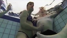 Teen Gives Handjob In Public Pool